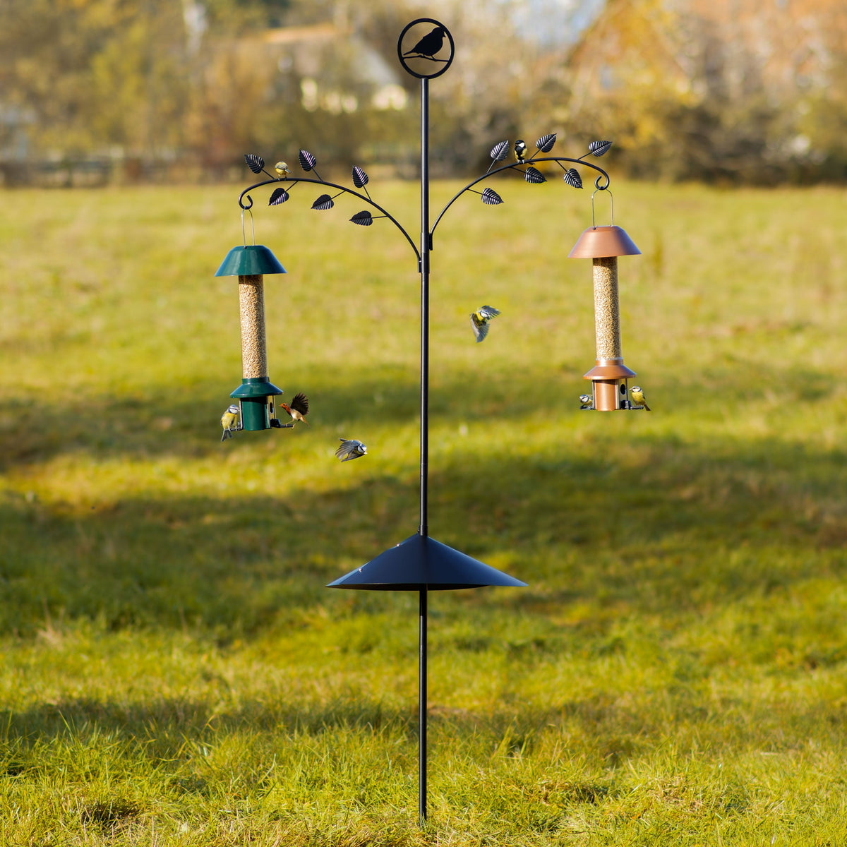 Roamwild PestOff Bird Feeding Station holding feeders 18 inches from the pole